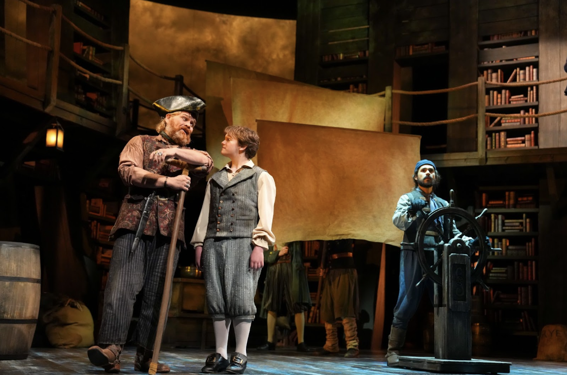 Long John Silver (Reed Sigmund), left, and Jim Hawkins (Truman Bednar) in Children's Theatre Company's production of "Treasure Island" directed by Rick Dildine.