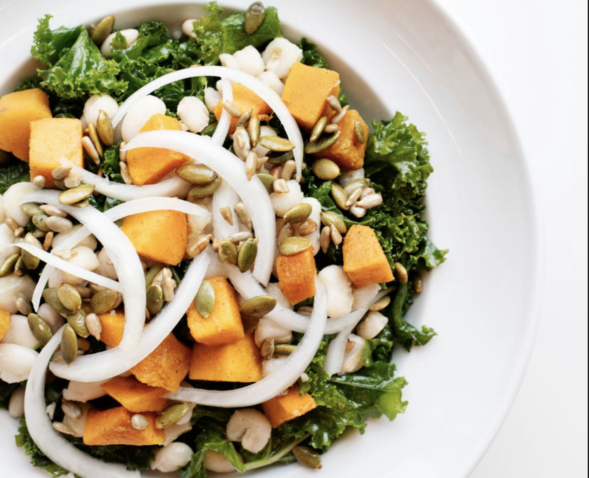A 3 Sisters Kale Salad with squash, hominy, beans, maple vinaigrette, and onion from Gatherings Cafe at the Minneapolis American Indian Center.