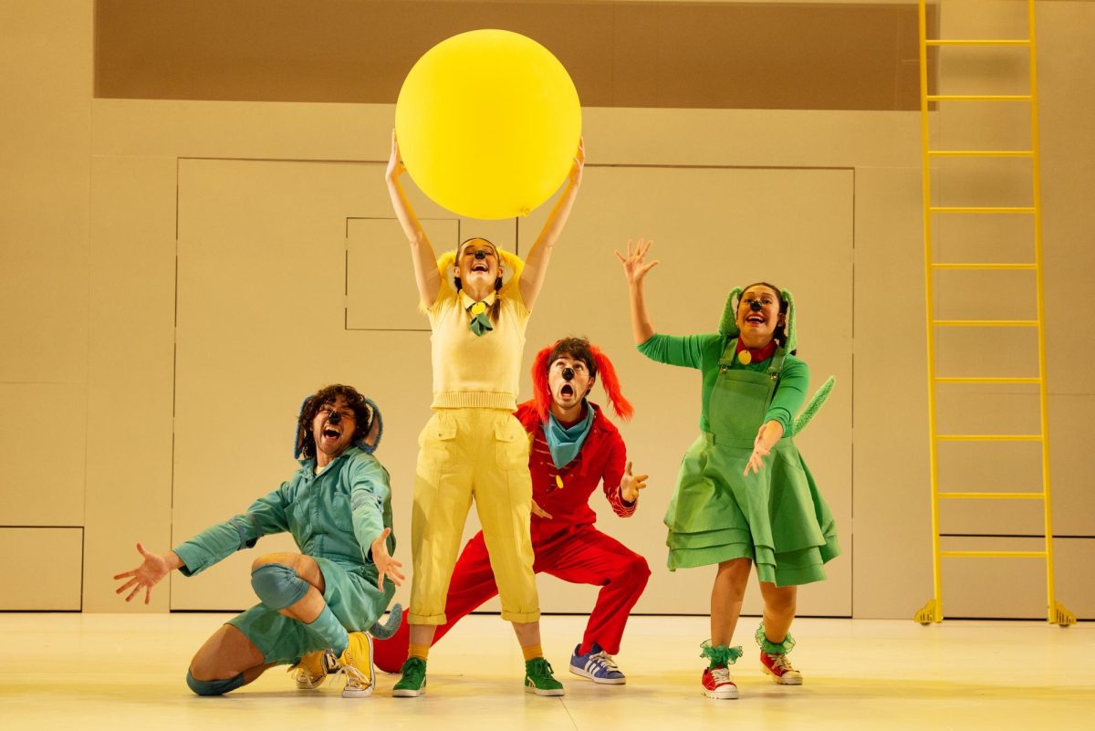 Julia Diaz, far right, playing Green Dog in "Go, Dog. Go! • Ve Perro ¡Ve!" at Children’s Theatre Company in Minneapolis. 