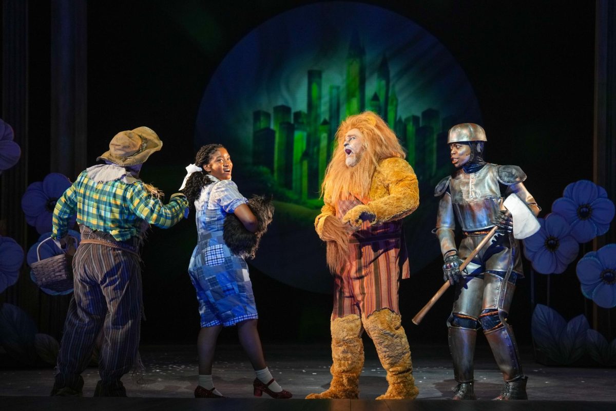 "The Wizard of Oz" cast, left to right, Dean Holt (Scarecrow), Aniya Bostick (Dorothy), Reed Sigmund (Cowardly Lion), and Regina Marie Williams (Tin Man) in Children's Theatre Company's 2026 production. (Glen Stubbe Photography)